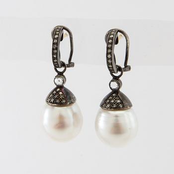 Earrings, a pair of oxidised silver with diamonds and cultured drop-shaped pearls.