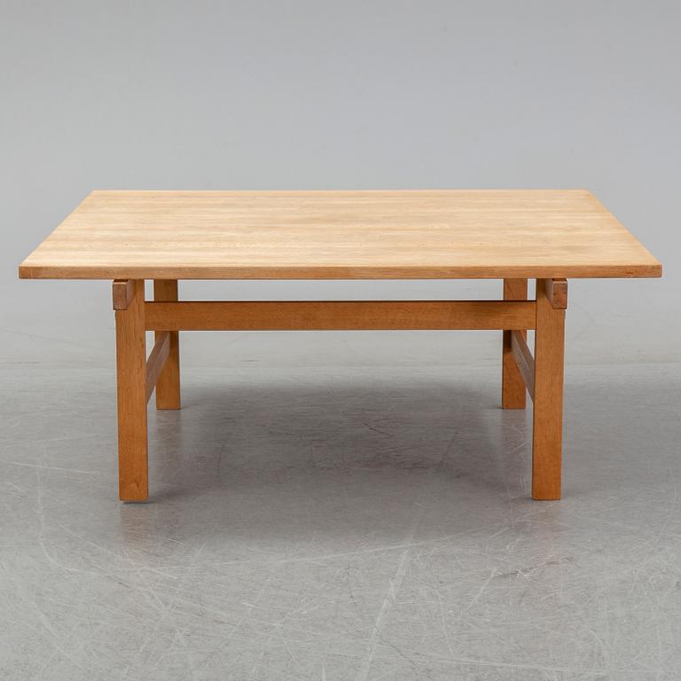 An oak coffee table by Hans J Wegner for Andreas Tuck, Denmark.