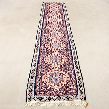 Senneh kelim rug from the gallery, semi-antique, approximately 380x87 cm.