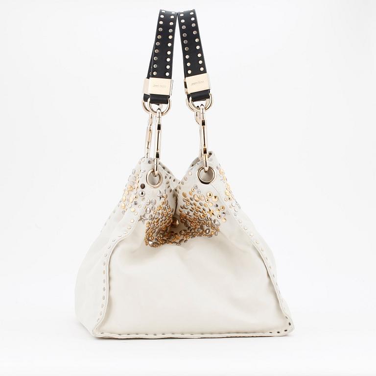 JIMMY CHOO, a white leather handbag with studs.