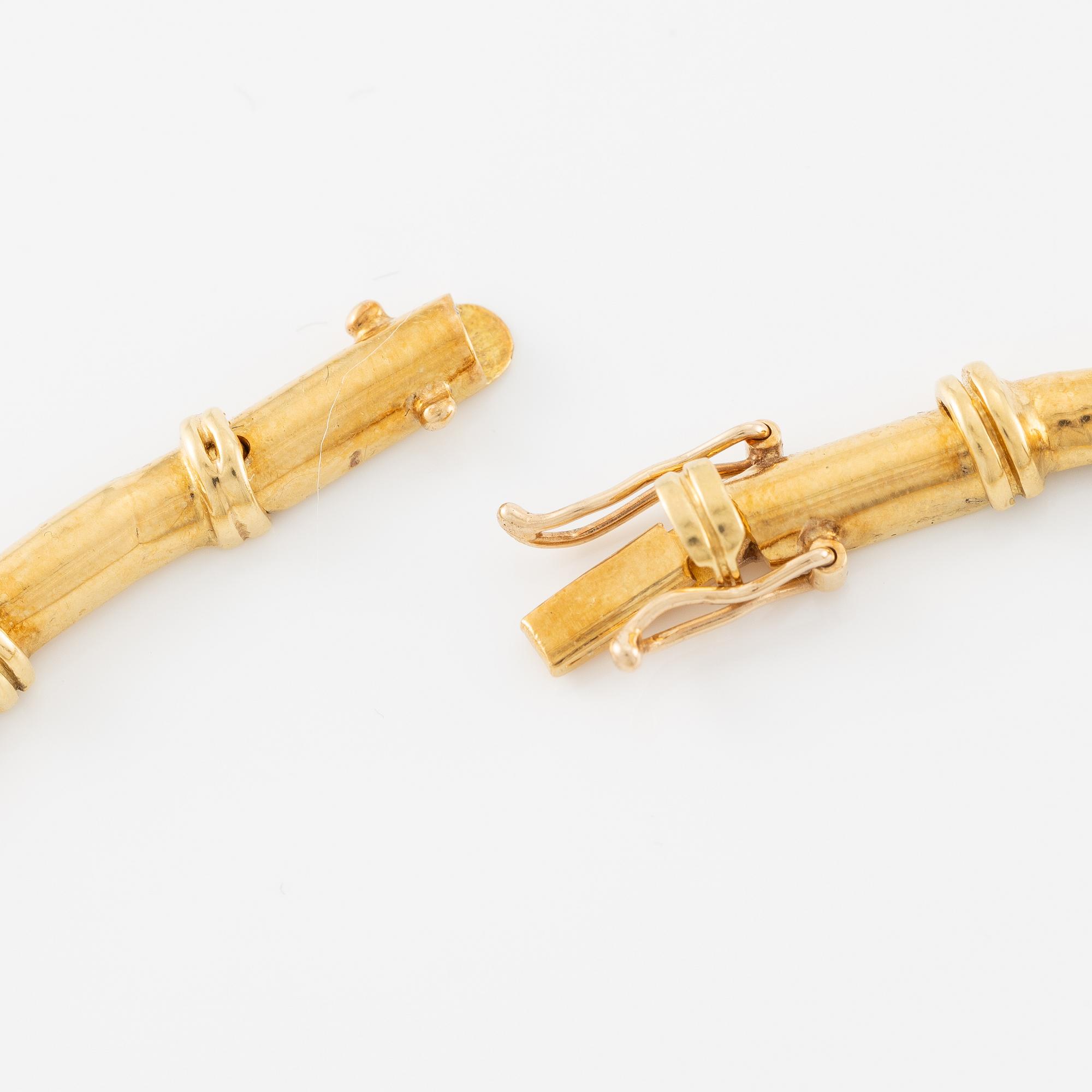 Collier 18K guld med safir och briljantslipade diamanter.