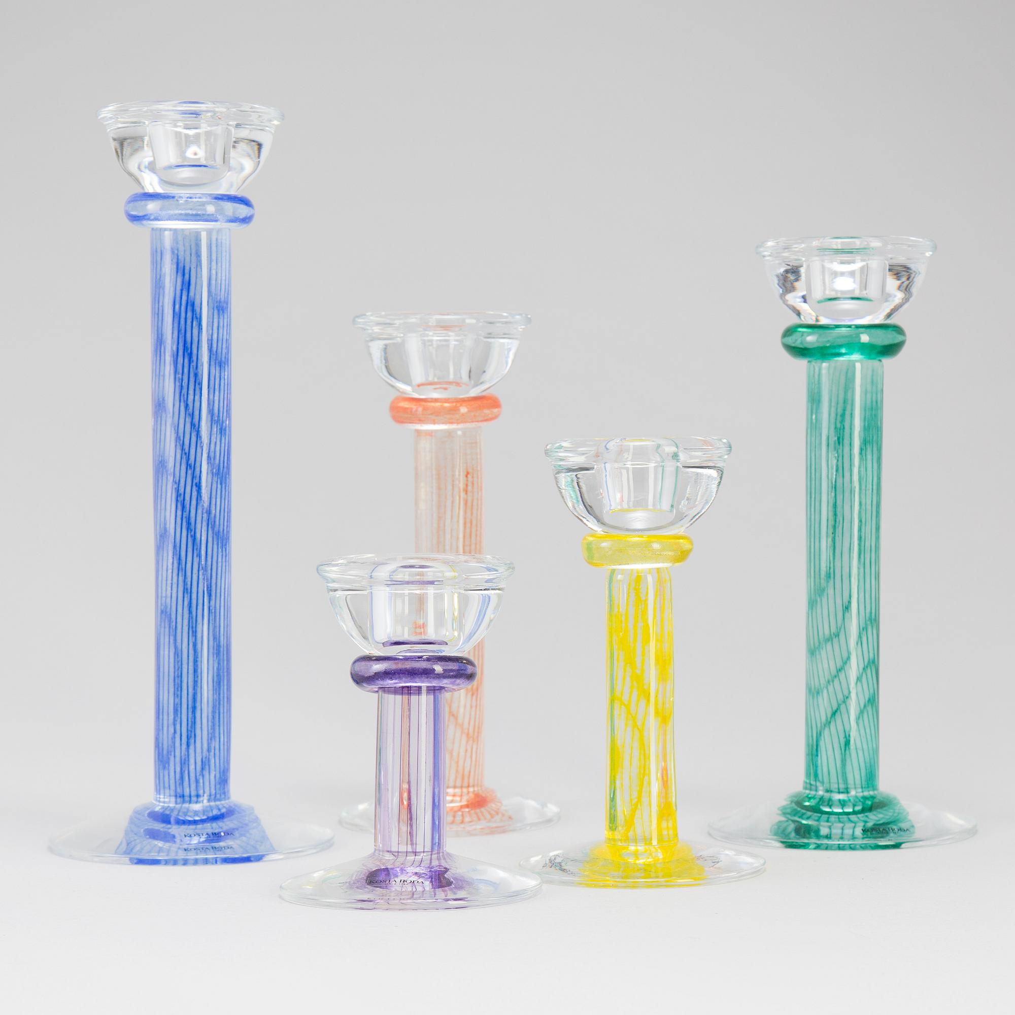 A set of five glass candlesticks by Kjell Engman för Kosta Boda.