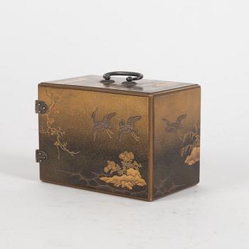 A Japanese lacquer box with three small drawers. Meiji.