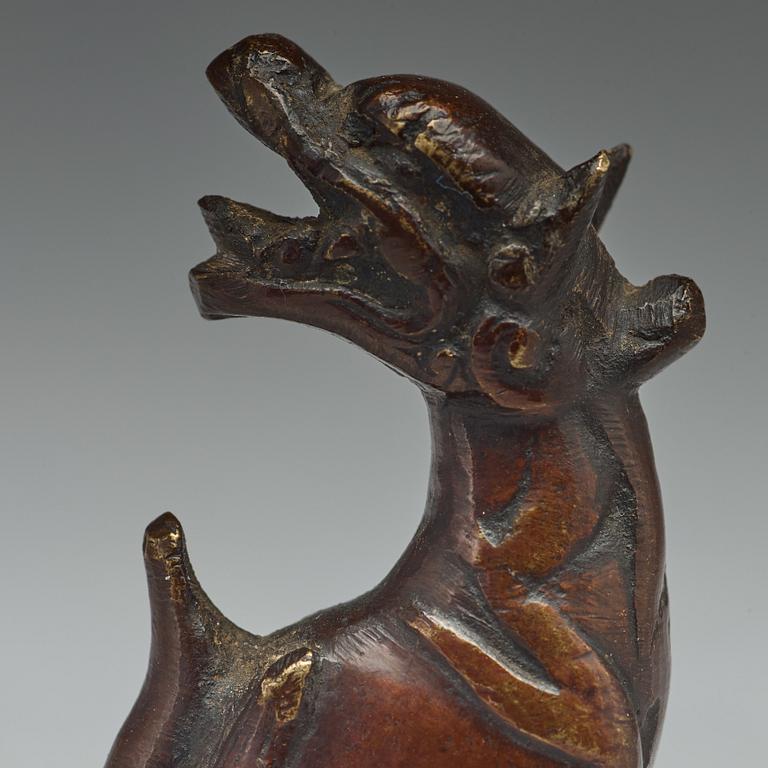 Two bronze pen rests, Qing dynasty, 18th Century.