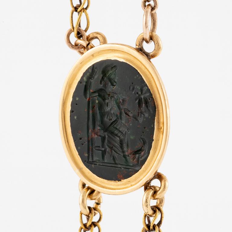 An 18K gold and hardstone intaglio necklace, 19th century.