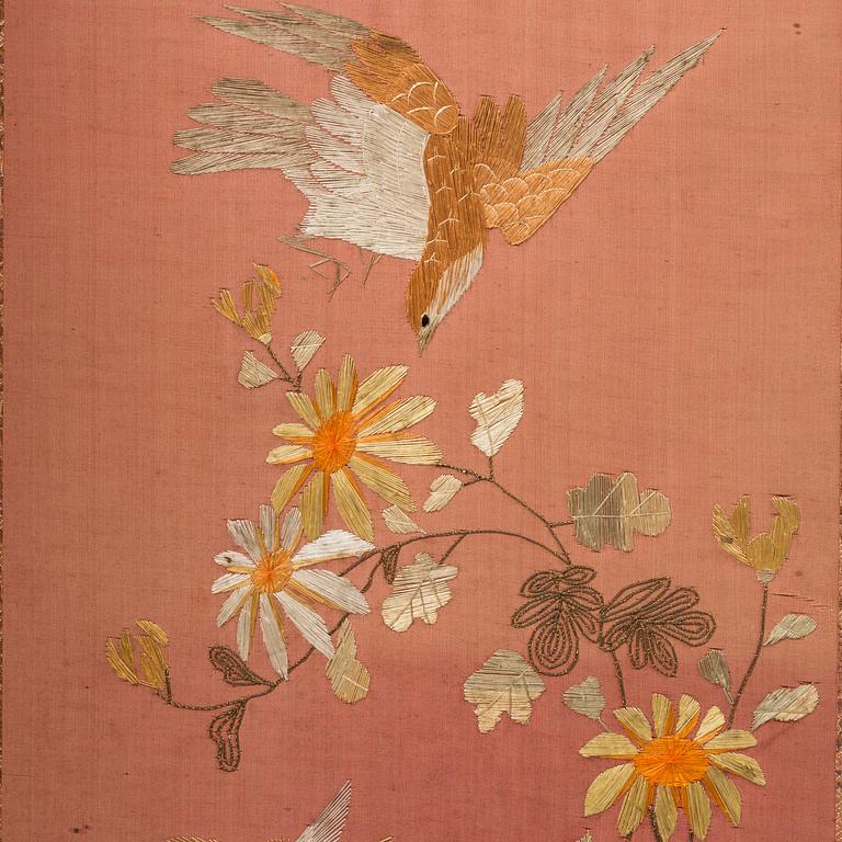 A Japanese embroidered four fold screen, 20th Century.