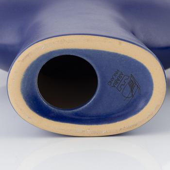 A pair of figurines by Howard Smith for Arabia, Finland.