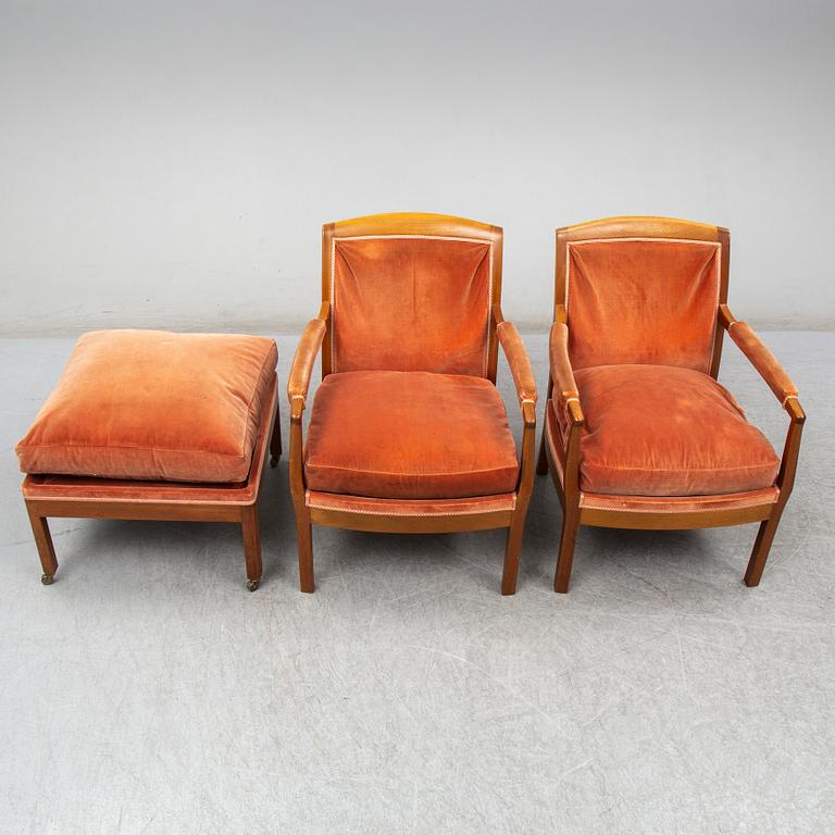 KERSTIN HÖRLIN-HOLMQUIST, a pair of 'Ofelia' armchairs with one foot stool, late 20th Century.