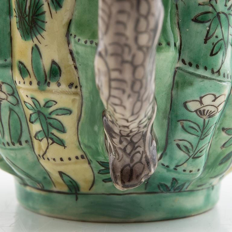 A set of three differently decorated tea pots with covers, Qing dynasty, 18century and 20th century.