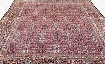 A semi-antique Semnan carpet, North Persia, c. 412 x 304 cm.