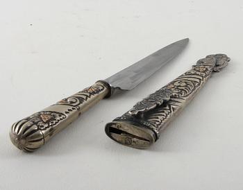 DOLK, delvis försilvrad metall.