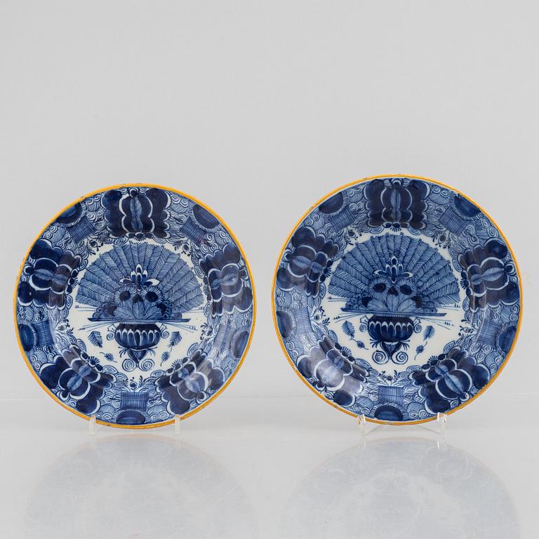 A pair of Peacock pattern earthenware plates, presumably De Klauw, The neatherlands, around 1800.
