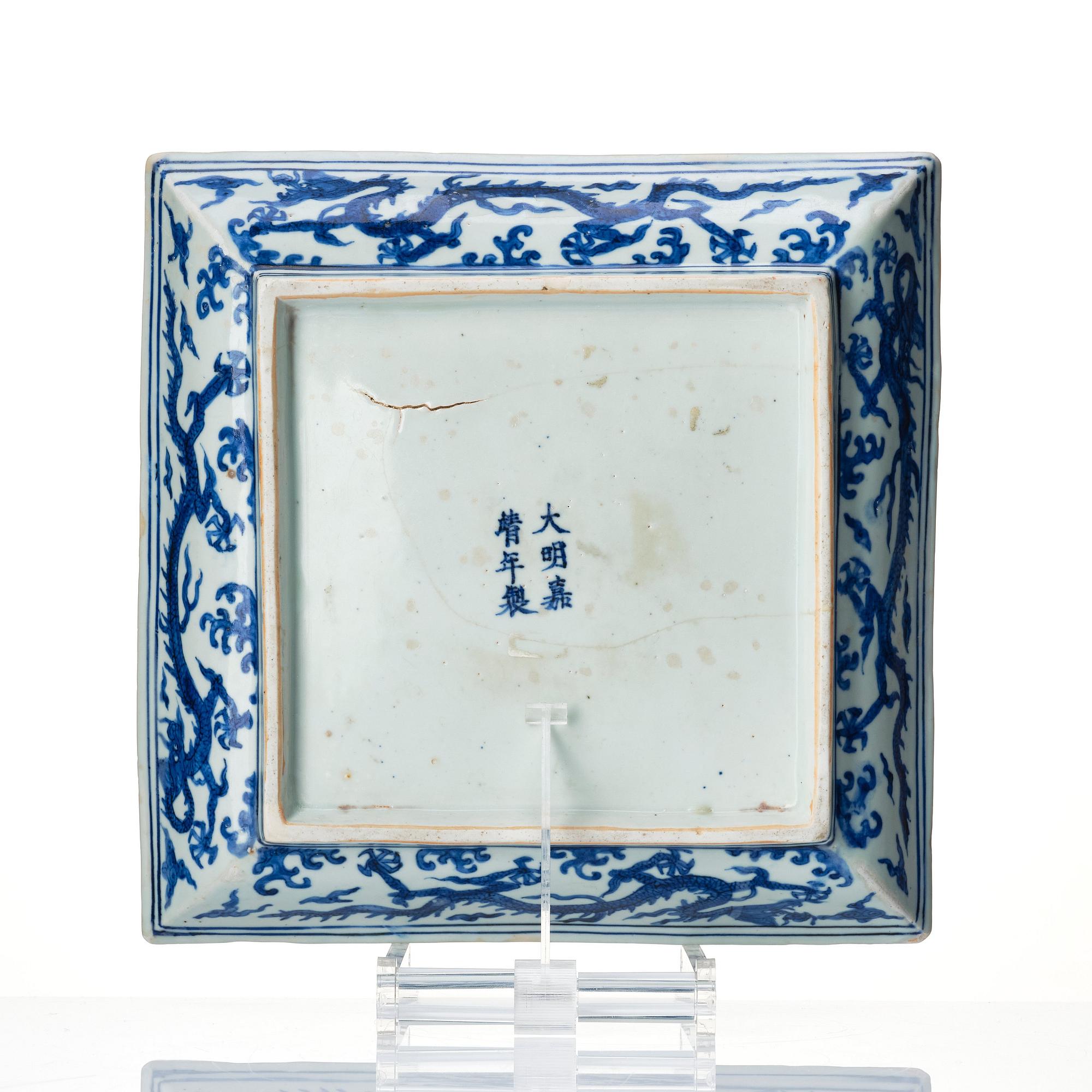 A blue and white dragon dish, Ming dynasty with Jiajings six character mark and of the period (1522-66).
