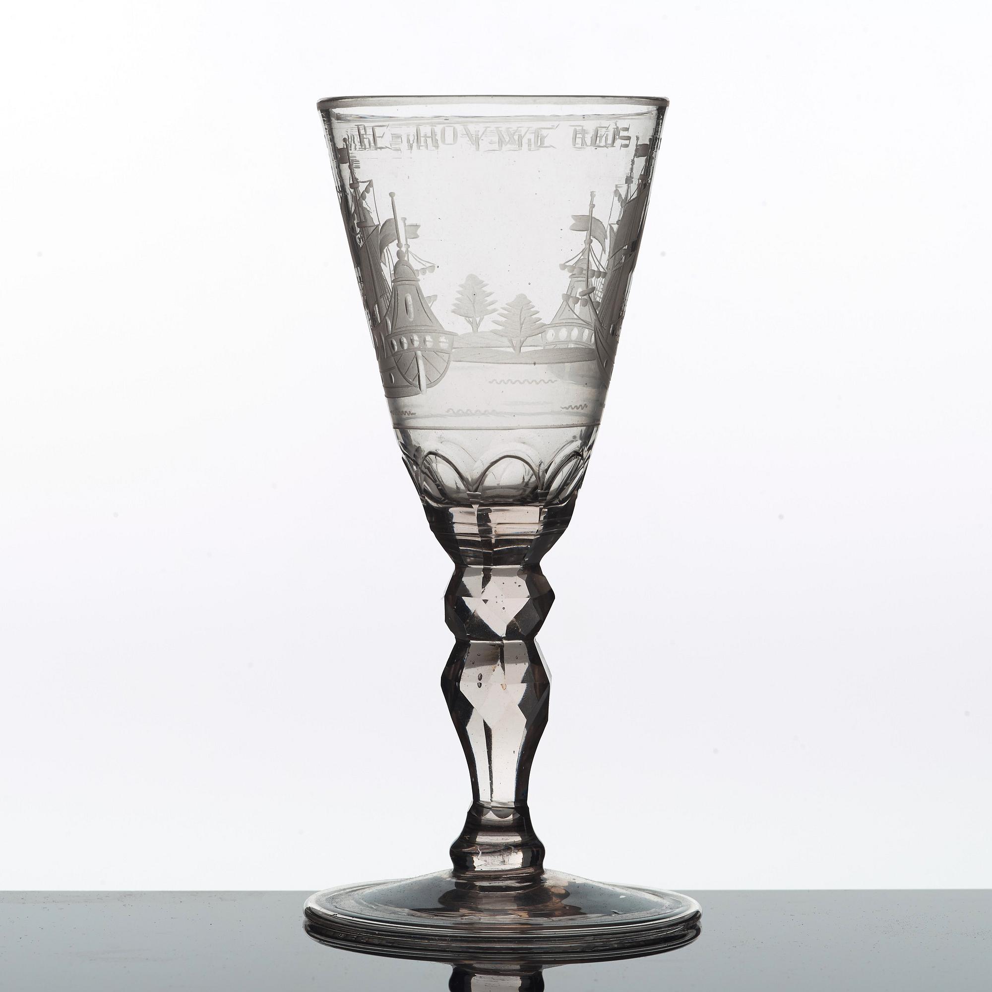 A Dutch cut and engraved wine glass, 18th Century.