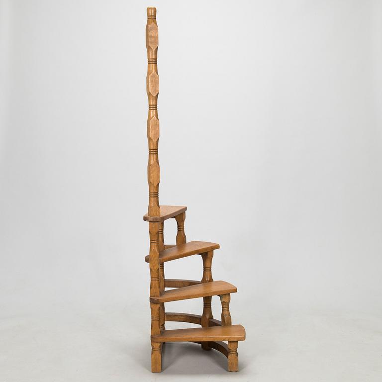 A late 20th century spiral library ladder.