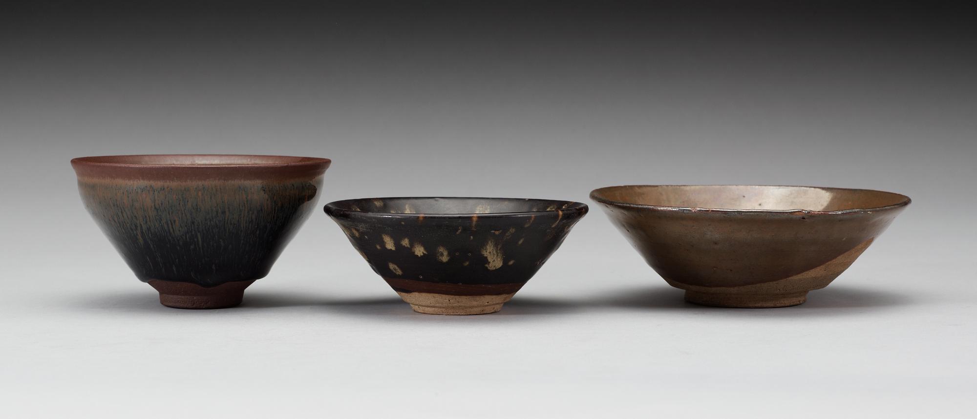 Three bowls, temmoku, a brown glazed and a brown-spotted glazed, Song dynasty (960-1279).