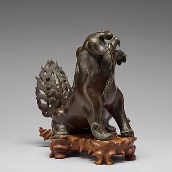 A bronze figure of a buddhist lion, Qing dynasty, 18/19th Century.