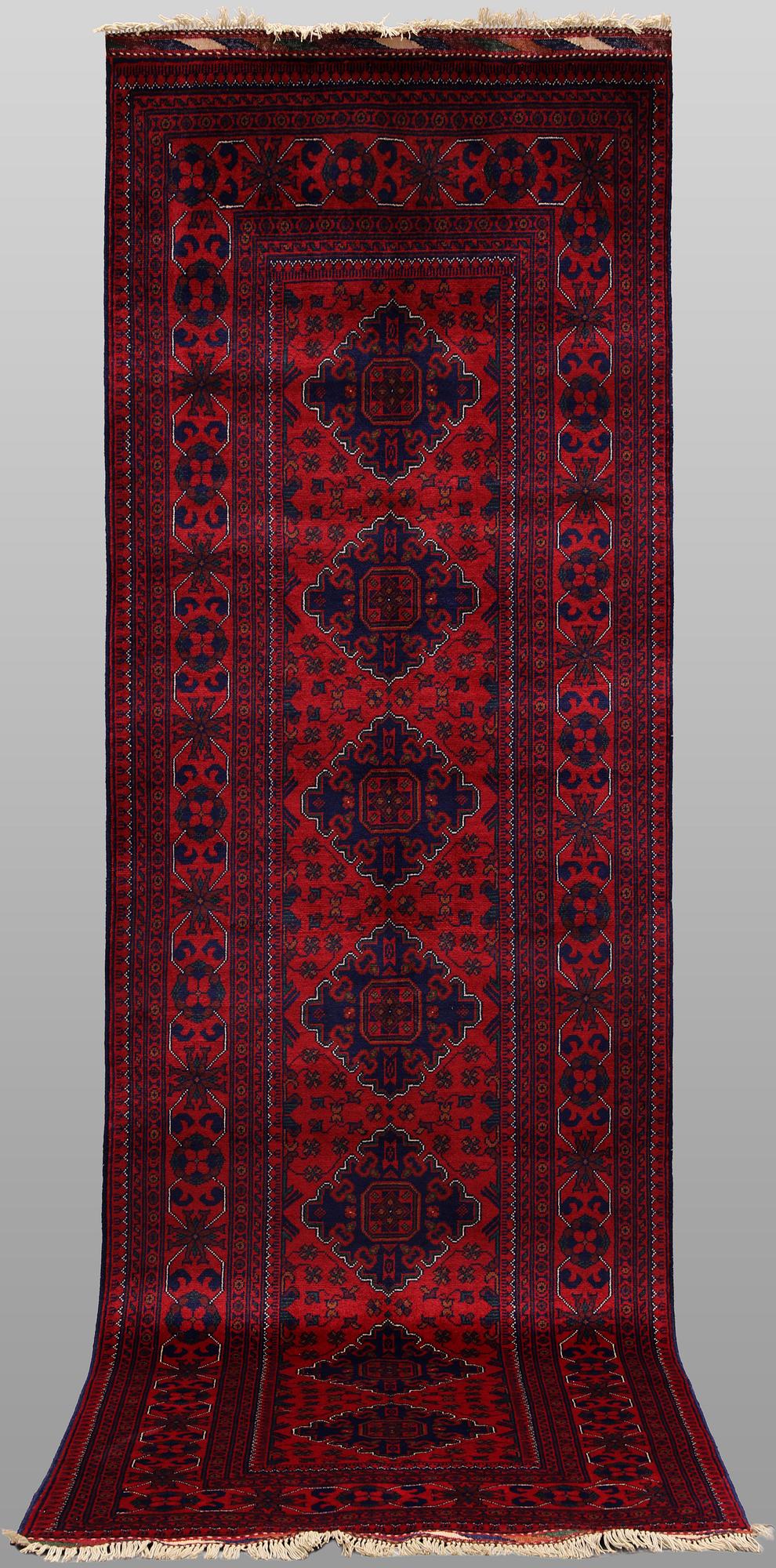 A Afghan runner carpet, 280 x 92 cm.