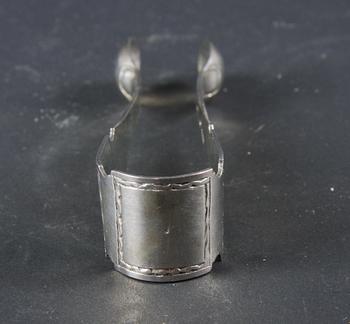 SOCKERTÅNG, silver, sengustaviansk/empire omkring 1800, otydliga stämplar.