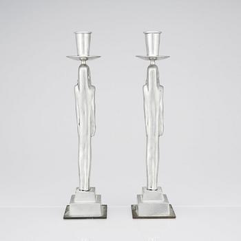 Edvin Öhrström, a pair of pewter and brass 'Egyptian' candlesticks, Svenskt Tenn, Sweden 1984.