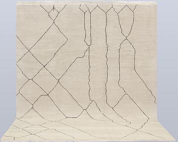 A Moroccan carpet, 305 x 251 cm.