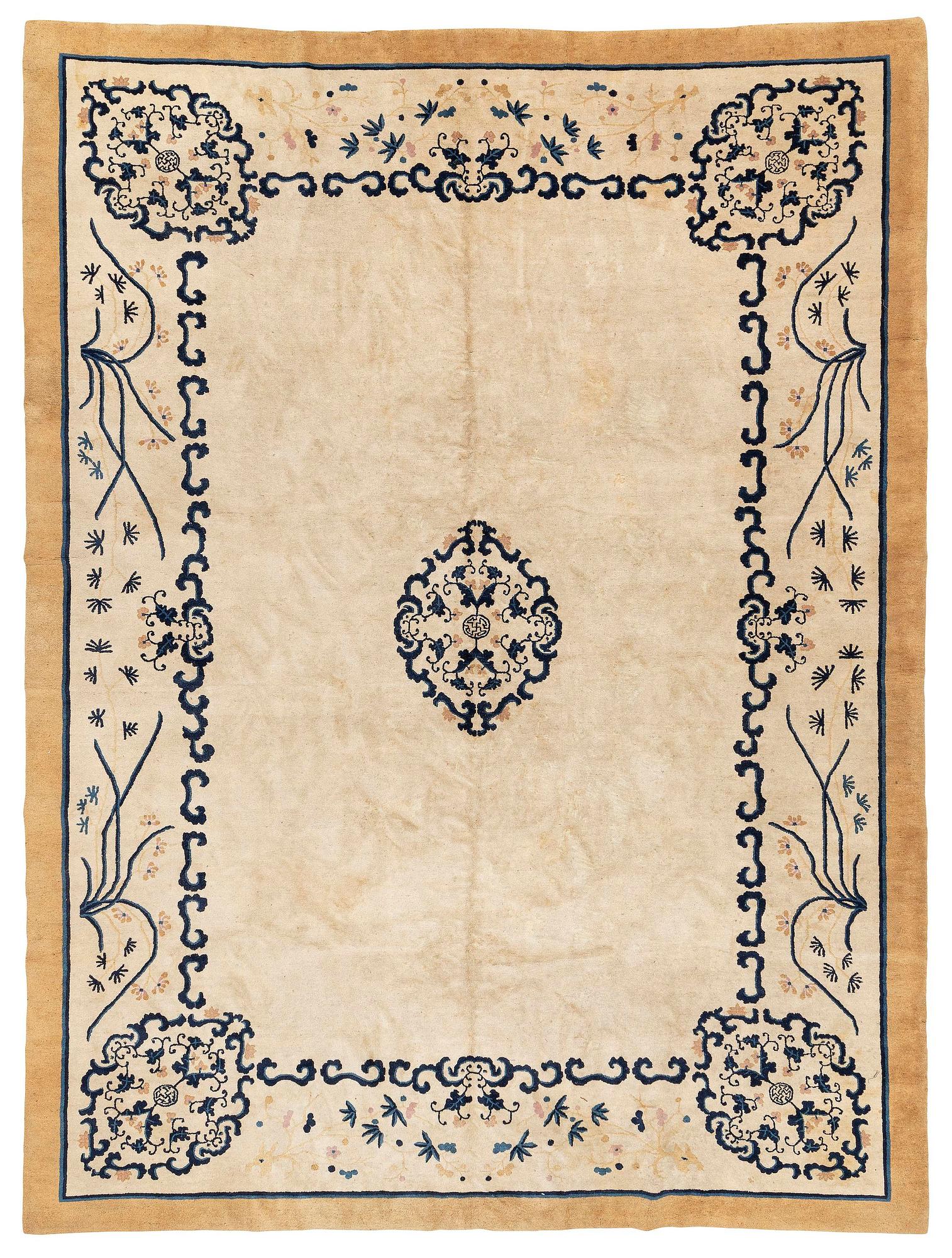 An antique Chinese carpet, 404 x 304 cm.