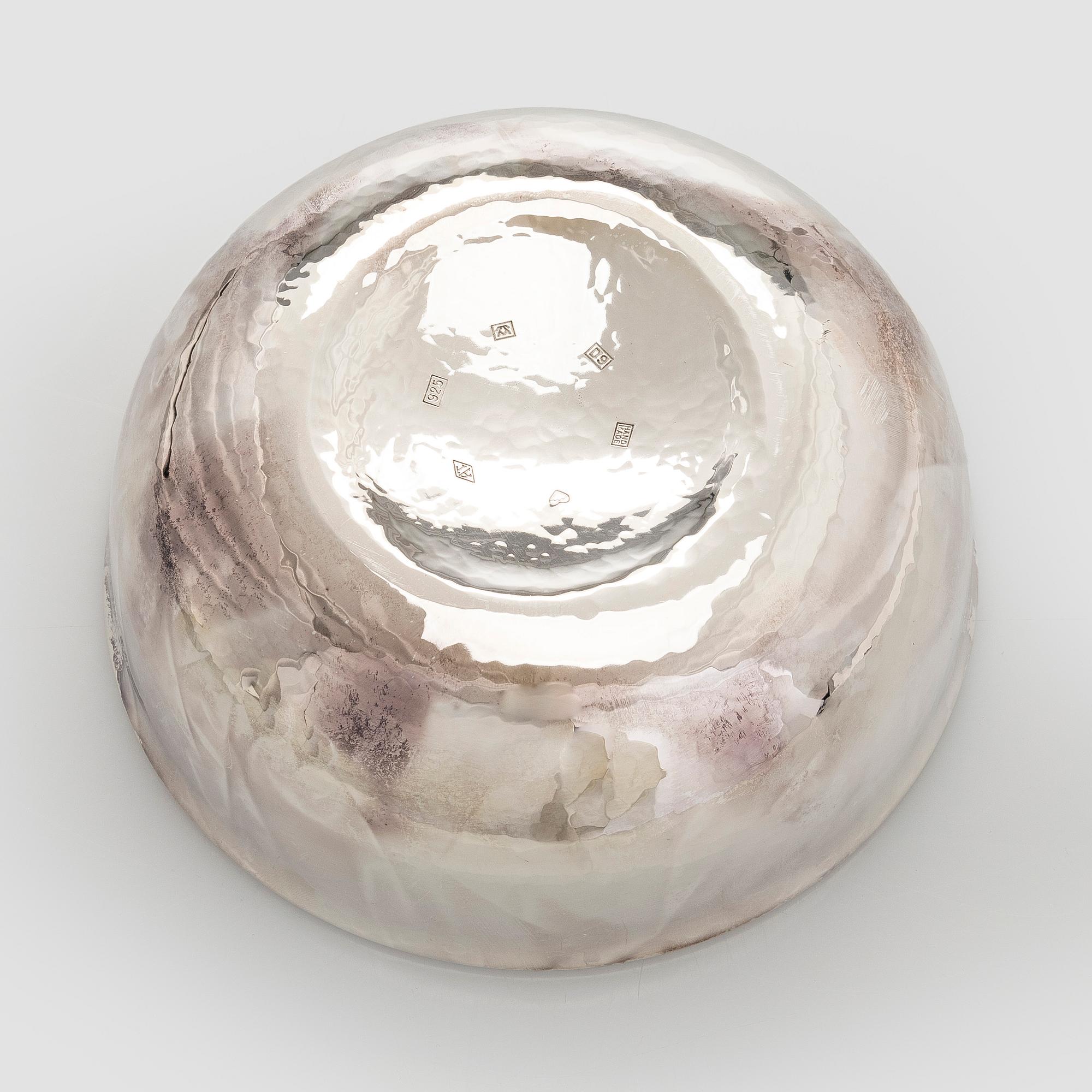 A set of three sterling silver and enamel bowls, maker's mark of A. Tillander, Turku 2005.