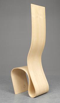 A Caroline Schlyter laminated birch chair "lilla h" by Forsnäs.