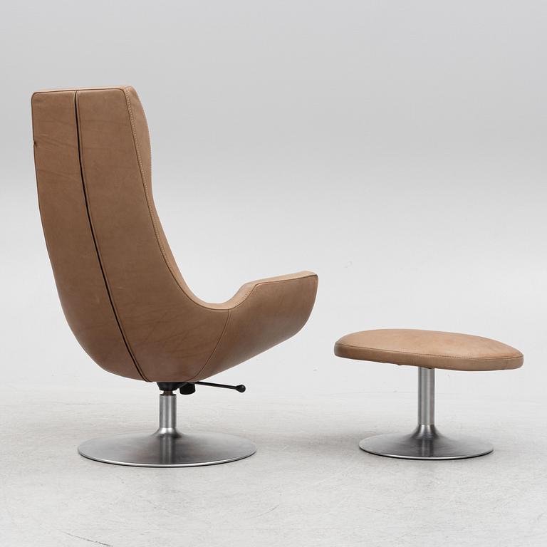 Carl-Henrik Spek, a Clipper armchair with ottoman, Ire Möbler, Tibro, Sweden, 21st century.