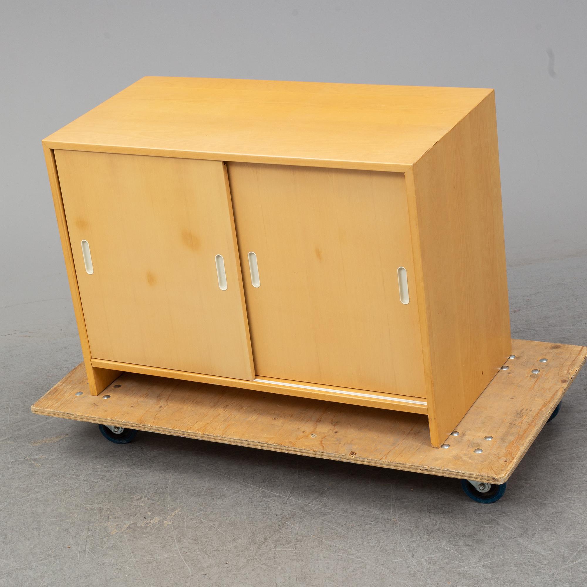 ALVAR AALTO, a model 217 birch cabinet from Artek, Finland.