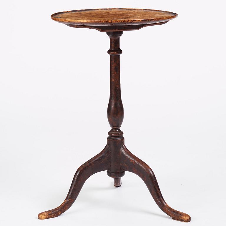 A burr-alder tilt-top table by J. Sjölin (master 1767-1785).