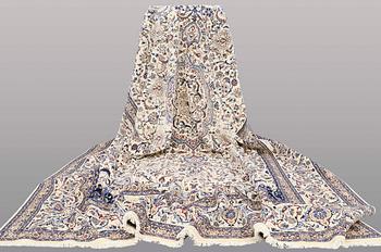 A CARPET, Nain part silk, s.k 9 LAA, 588 x 393 cm.