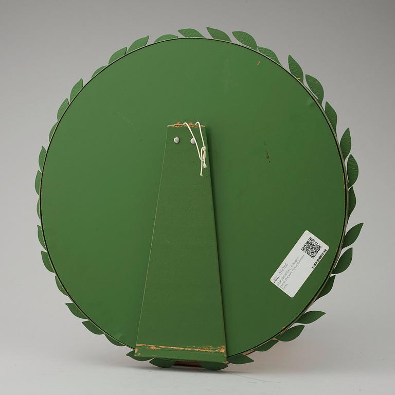 An Estrid Ericson green lacquered pewter mirror, Svenskt Tenn.