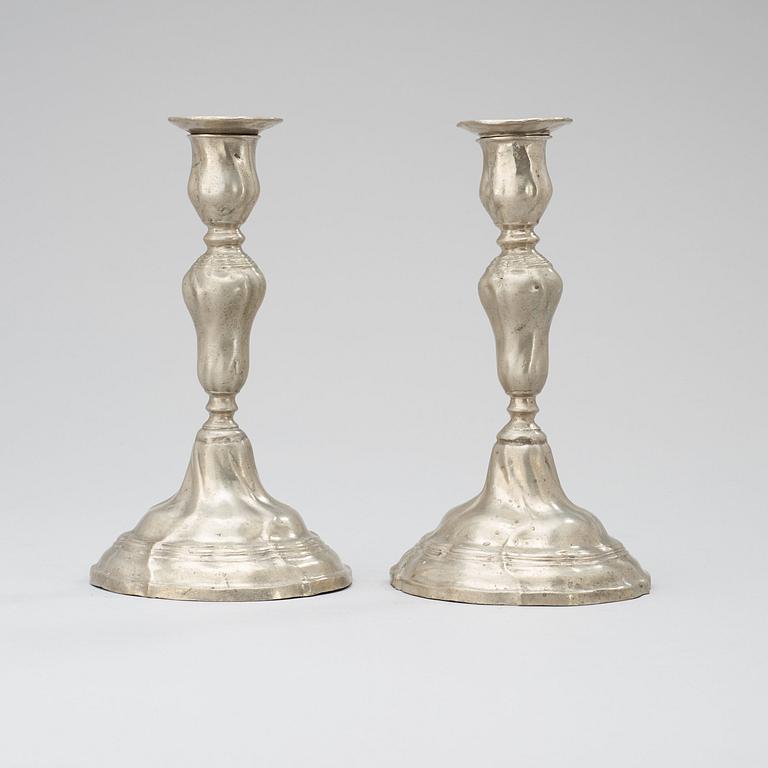 A pair of Rococo pewter candlesticks by Olof Roos, master in Östhammar 1782.