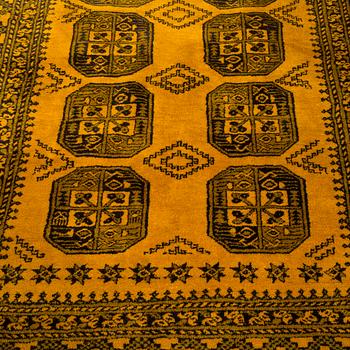 An Afghan carpet, circa 220 x 179 cm.