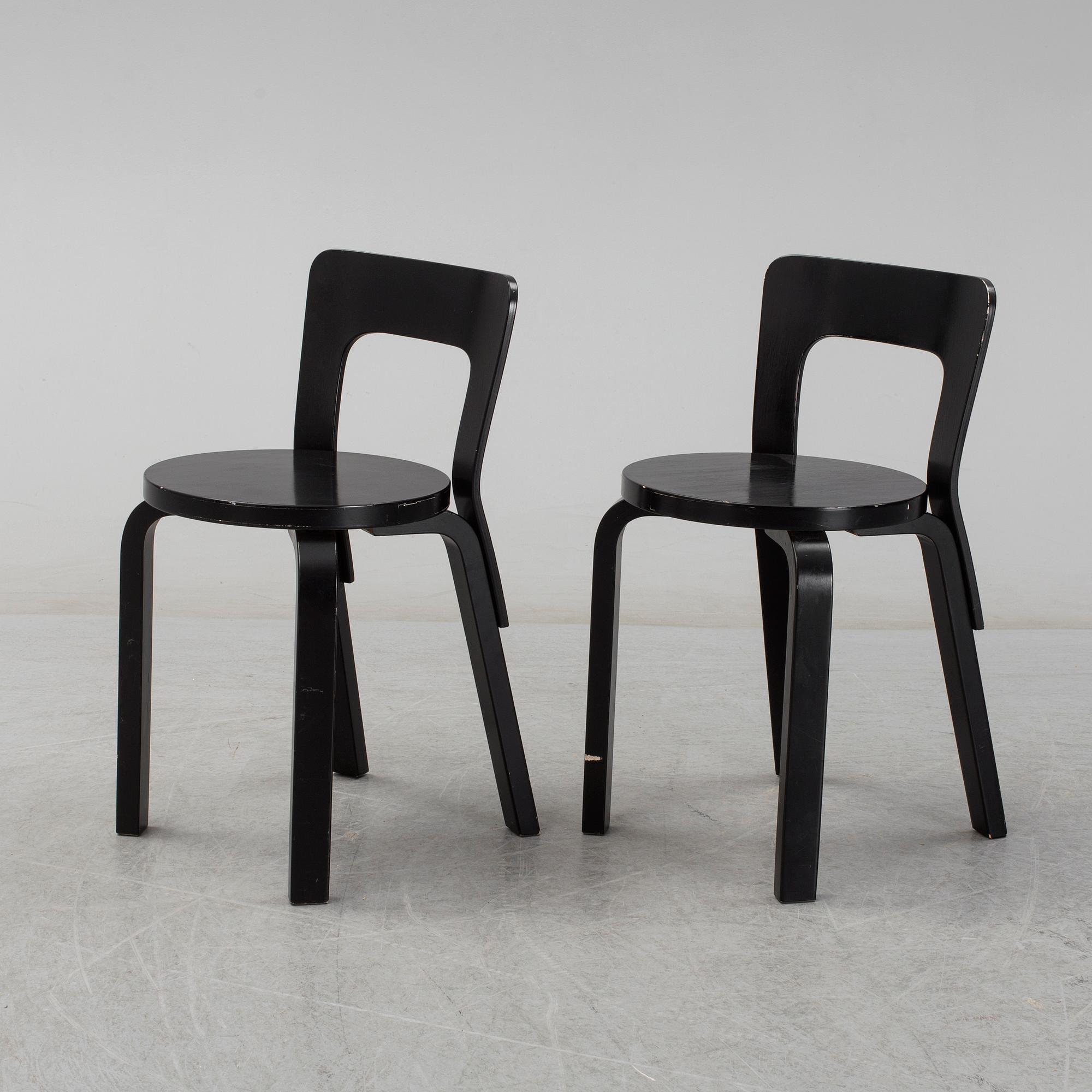 ALVAR AALTO, a pair of painted model 65 chairs from Artek, Finland.
