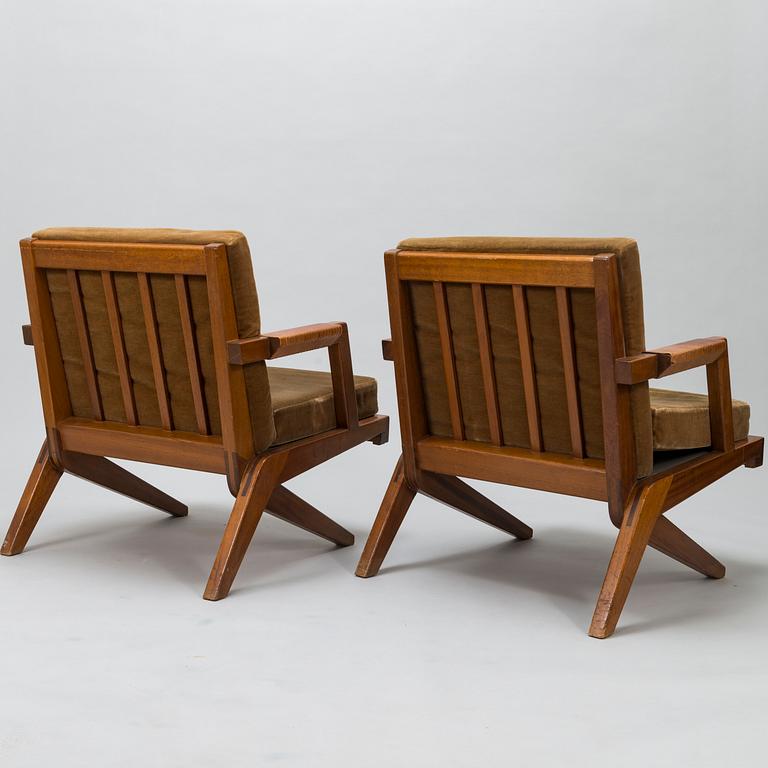 OLAVI HÄNNINEN, A 1960s 'Bumerang' armchairs for HMN Huonekalu Mikko Nupponen, Lahti, Finland.