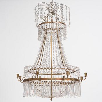 A late Gustavian nine-light gilt brass and cut glass chandelier, Stockholm, late 18th century.