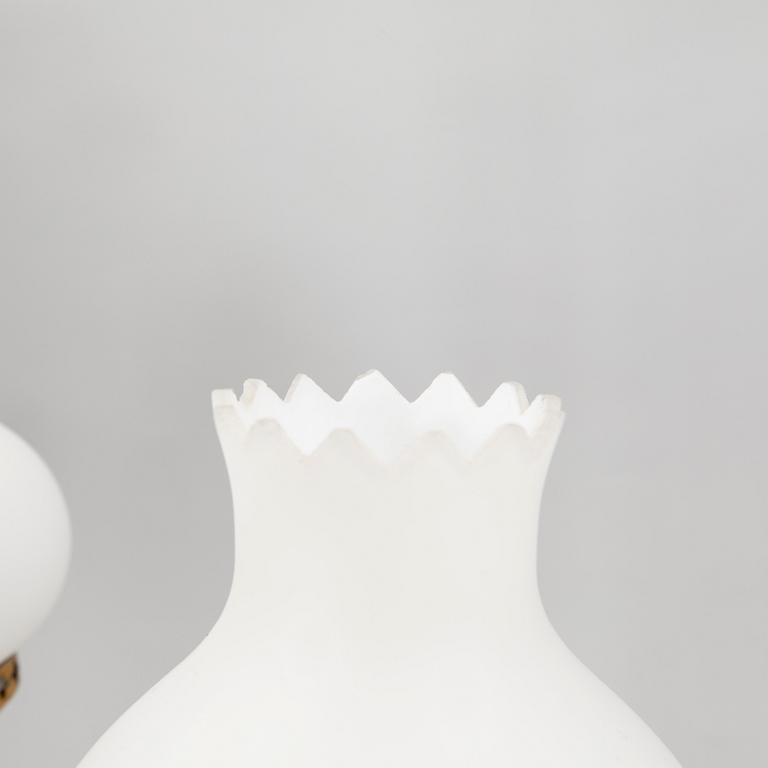 Taklampa 1900-talets mitt.