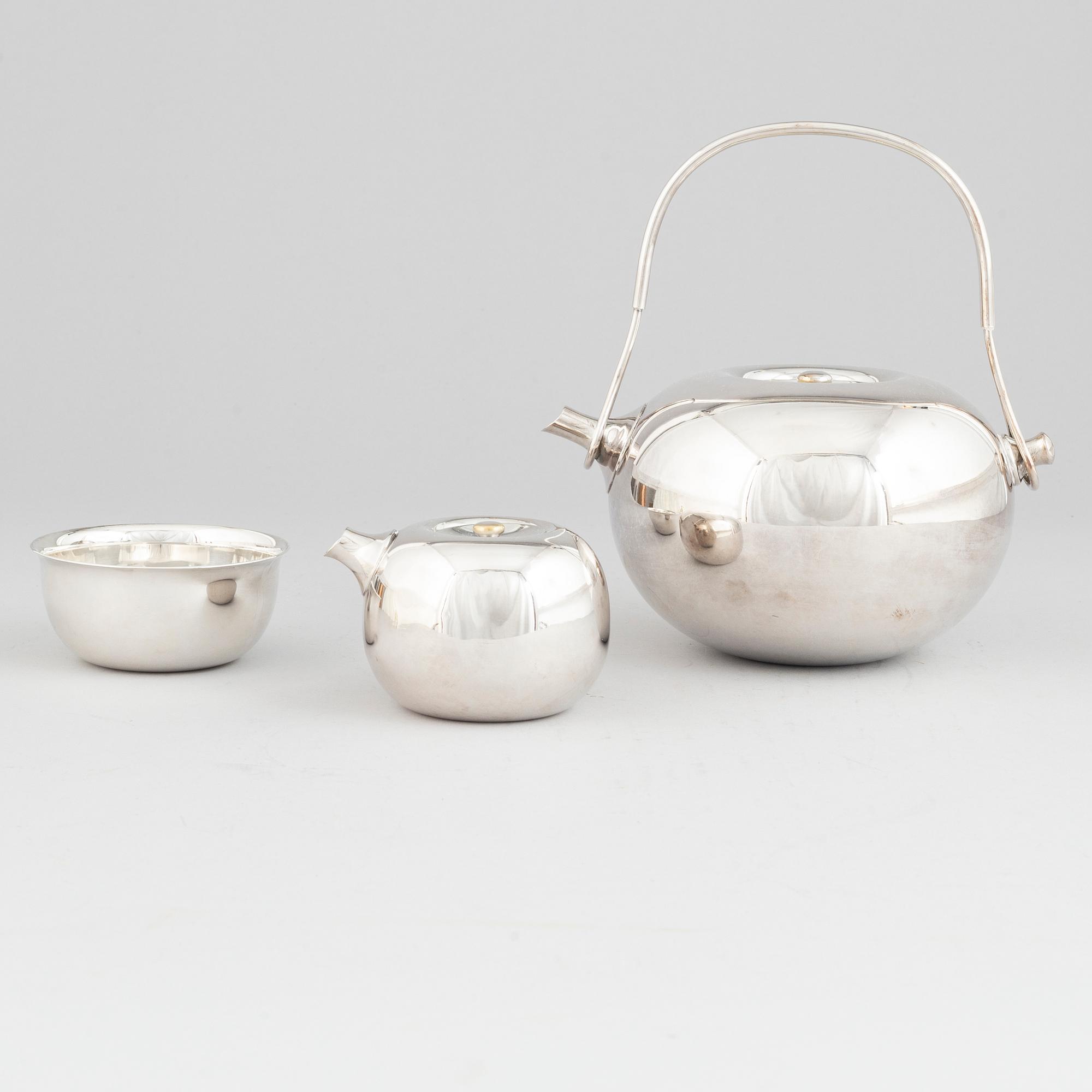 Vivianna Torun Bülow-Hübe, an electroplated brass teapot, a creamer and a sugarbowl, Dansk International Designs Ltd.