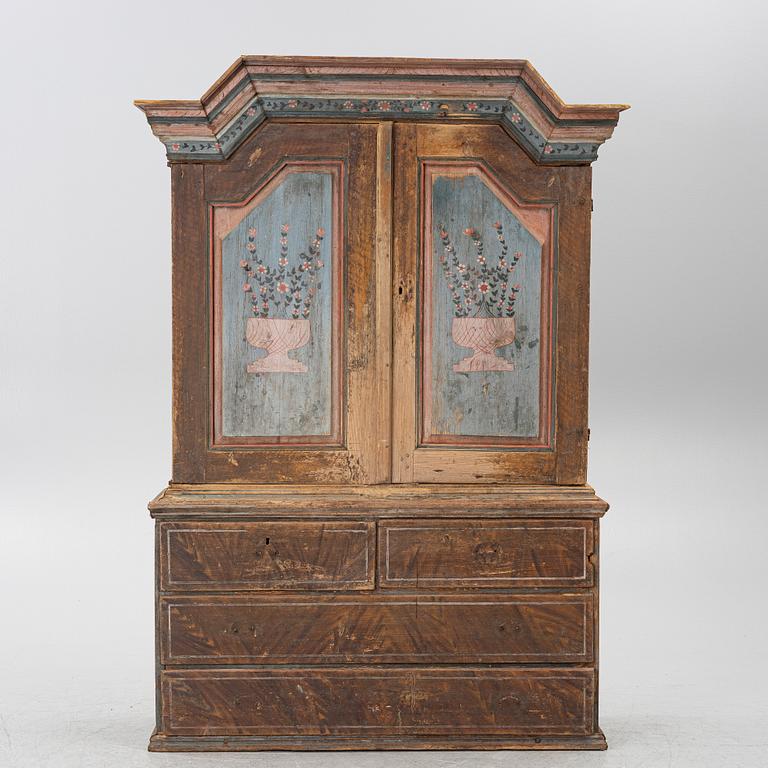 A folk-art cabinet attributed to  "Gammelmålaren" Anders Nilsson (Brunskog, 1807–1889).