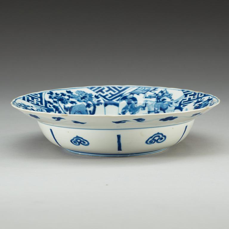 A blue and white klappmutz bowl, Qing dynasty, with Kangxi six character mark and of the period (1662-1722).