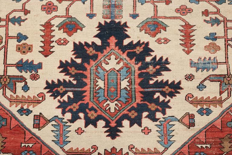 An antique Heriz Serapi carpet, West Persia, c. 616 x 407 cm.
