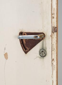 An Alvar Aalto borch plywood door, specifically for a patient's room of the Paimio Sanatorium, Finland ca 1932.