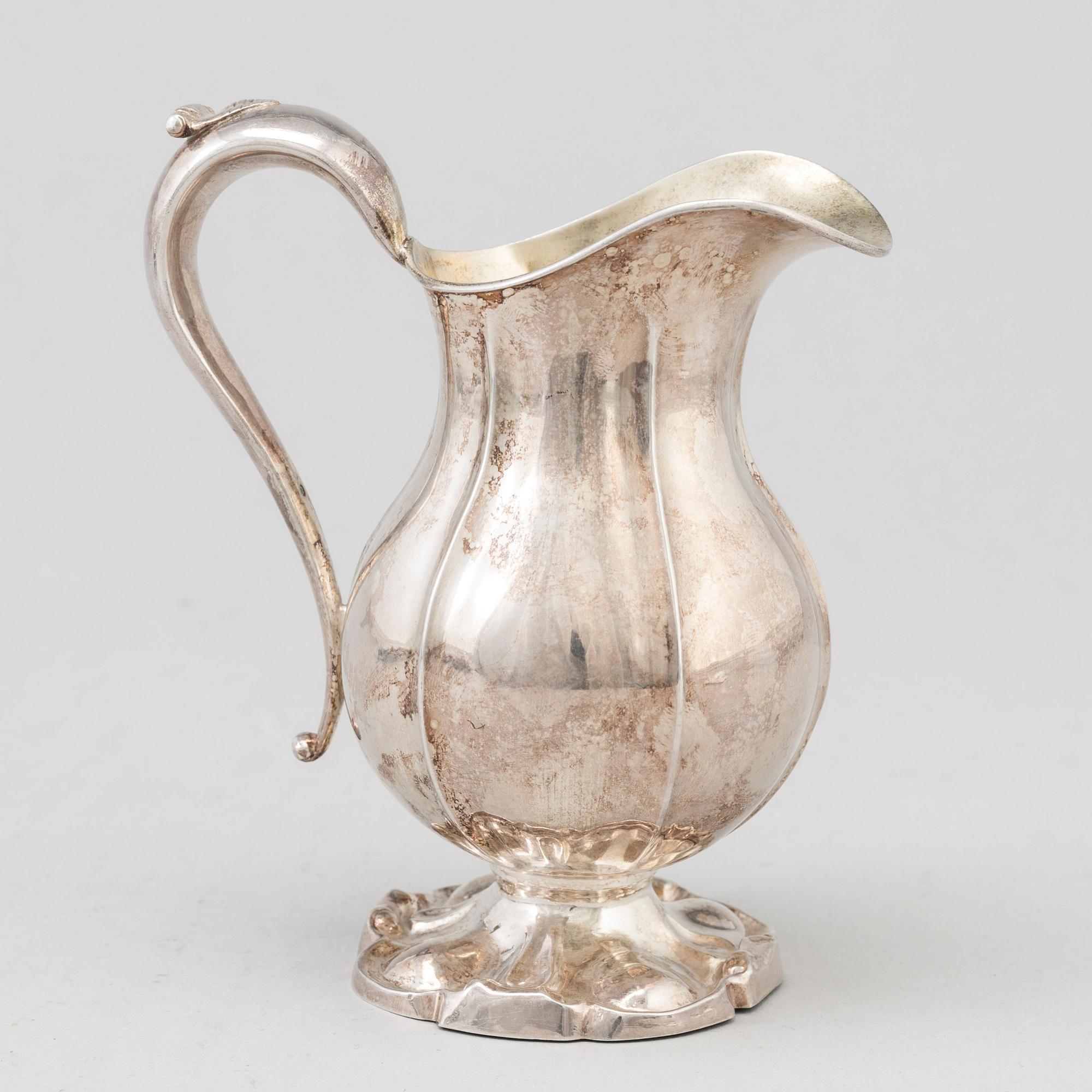 A Swedish SILVER CREAM JUG, 1857, Maker's mark Bror Erik Skogsborg, Eskistuna. Weight ca 135 g.