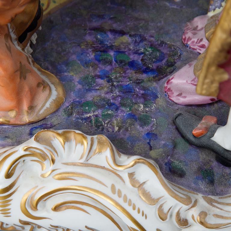 A Rococo style porcelain figurine group, Rudolstadt Volkstedt, Germany, early 20th Century.