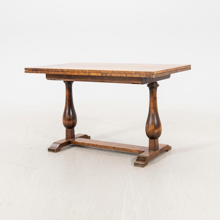 A 1940s birch dining table/library table.