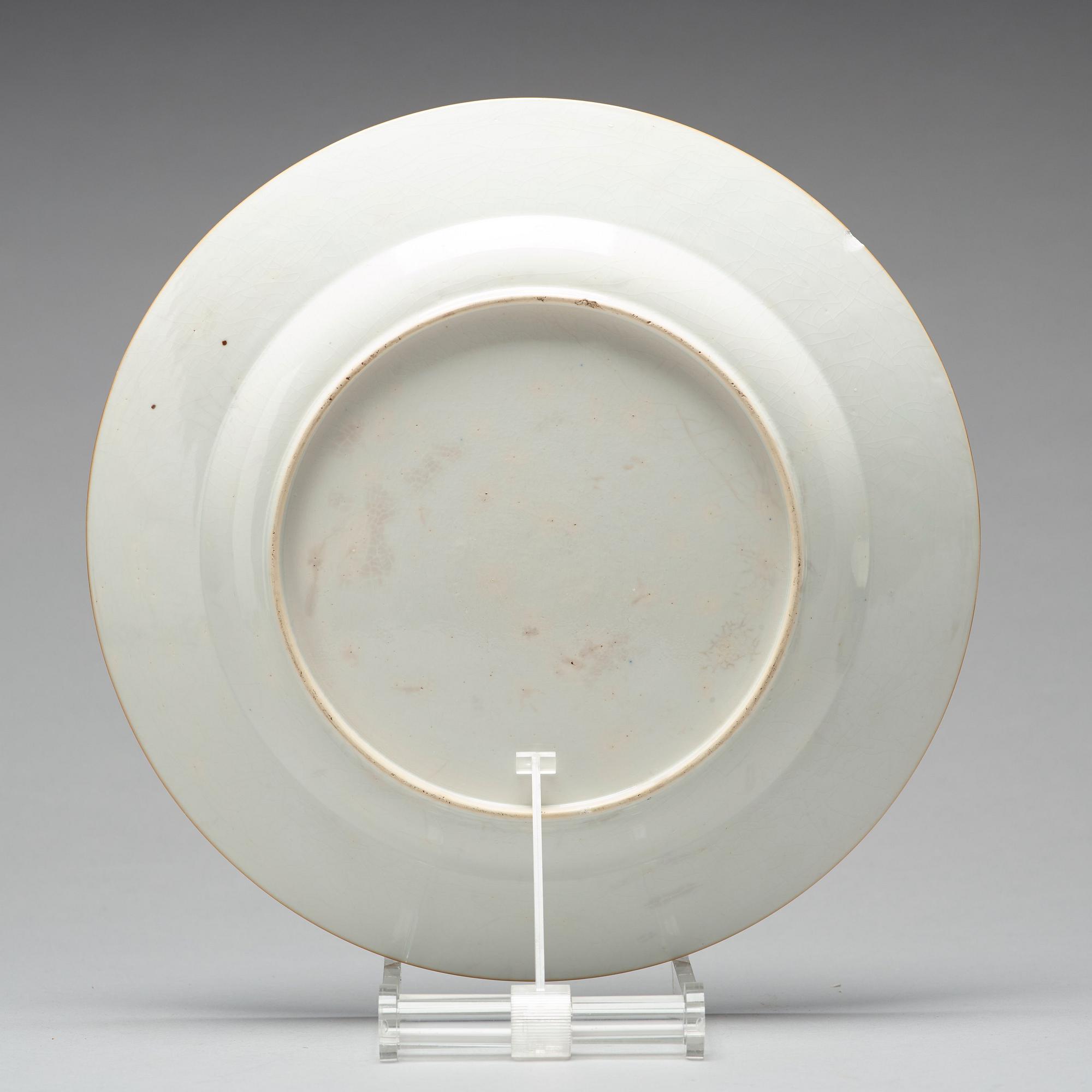 A blue and white armorial tureen with cover, and stand, Qing dynasty, 18th Century.
