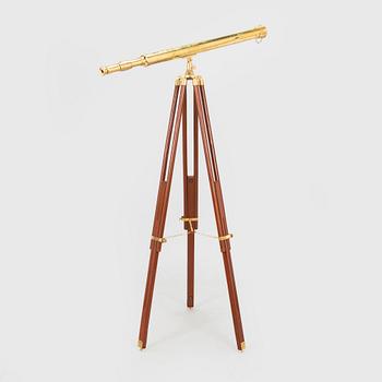 A spotting scope with stand from the latter half of the 20th century.