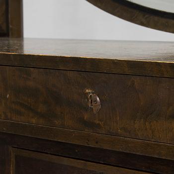 A 1930's dressing table and a stool.